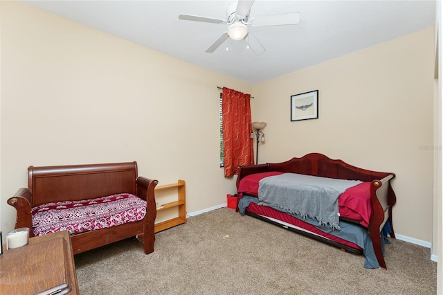 bedroom with ceiling fan and carpet floors