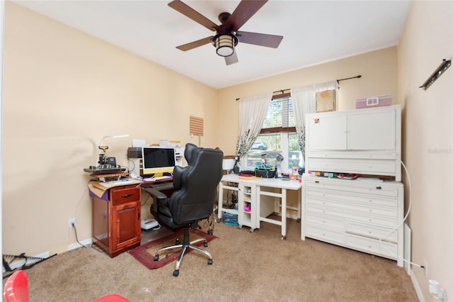 office area with ceiling fan and light colored carpet