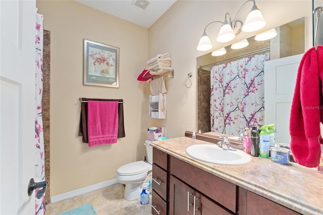 bathroom with toilet, vanity, and curtained shower