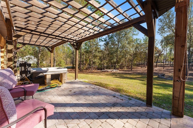 view of patio / terrace with a hot tub and a pergola