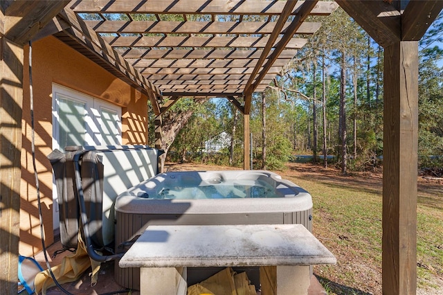 view of patio featuring a pergola and a hot tub