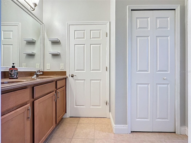 bathroom featuring tile patterned floors and vanity