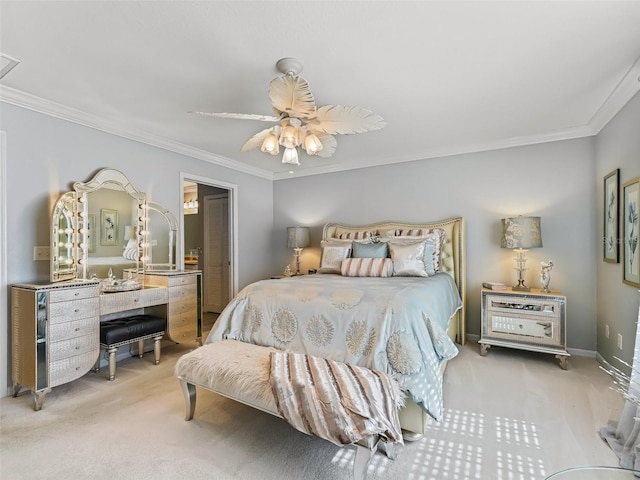 carpeted bedroom with ceiling fan and ornamental molding