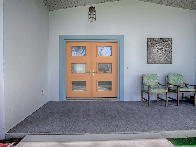 property entrance featuring french doors