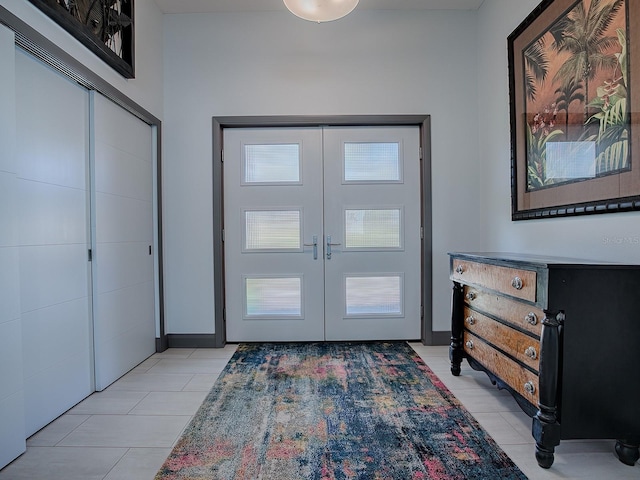 tiled entryway with french doors