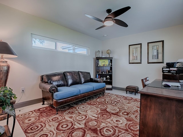 interior space with ceiling fan