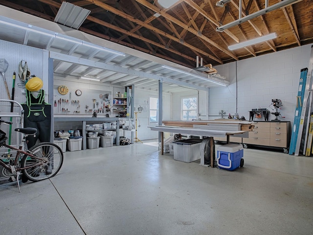 garage with a workshop area