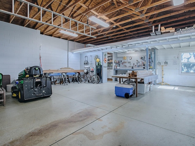 garage featuring a workshop area