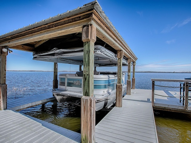 view of dock with a water view