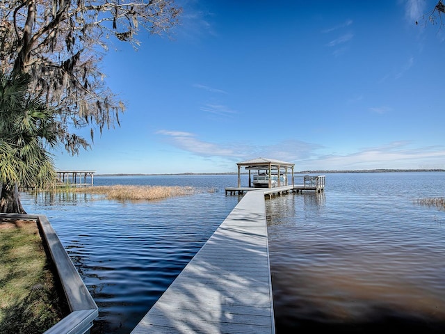 view of dock with a water view