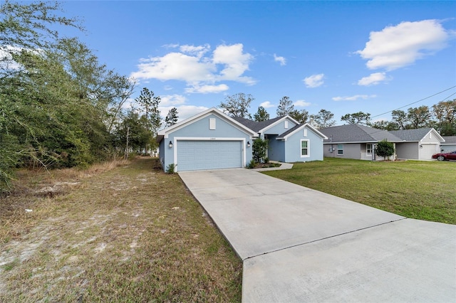 ranch-style home featuring a garage and a front lawn