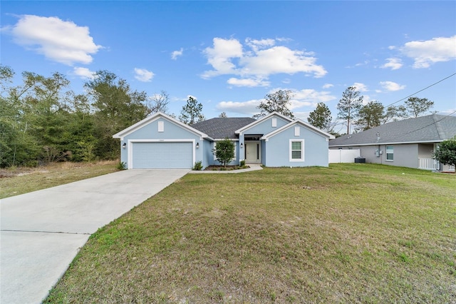 ranch-style home with a garage and a front yard