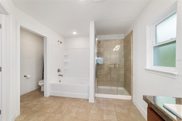 full bathroom featuring vanity, toilet, independent shower and bath, and tile patterned flooring