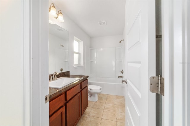 full bathroom featuring vanity, bathing tub / shower combination, tile patterned floors, and toilet