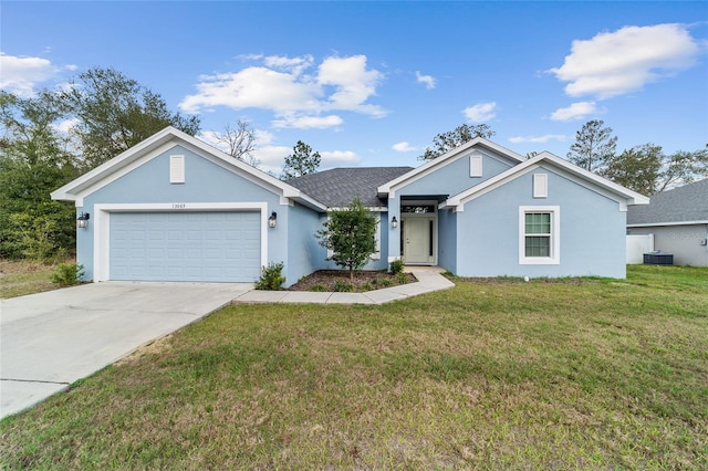 ranch-style home featuring a garage, central AC, and a front lawn