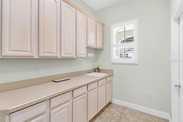 laundry room featuring sink