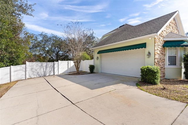 view of home's exterior featuring a garage