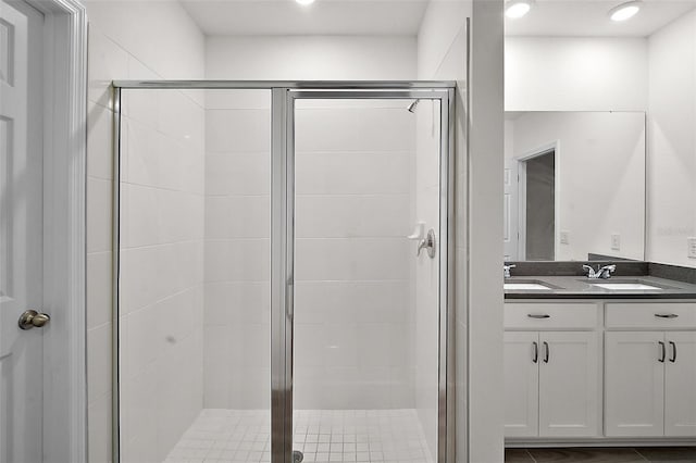 bathroom featuring vanity and walk in shower