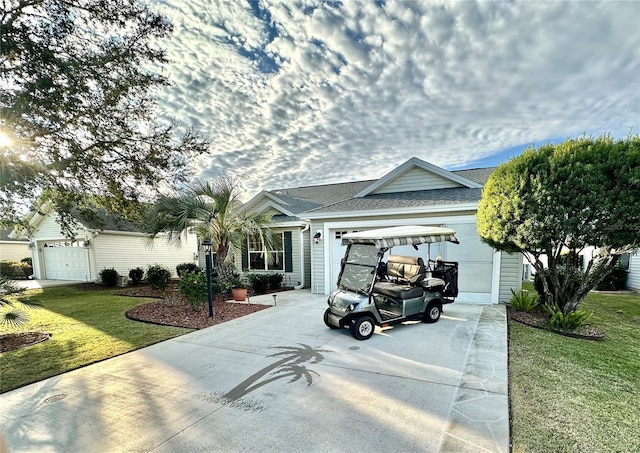 ranch-style house with a front lawn and a garage