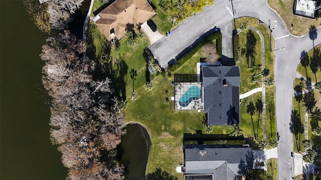 birds eye view of property featuring a water view