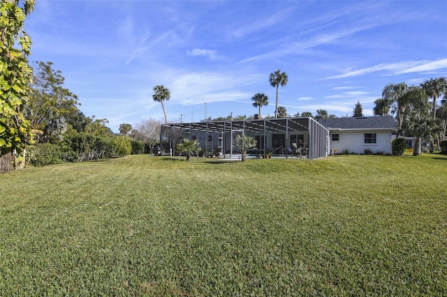 view of yard featuring a lanai