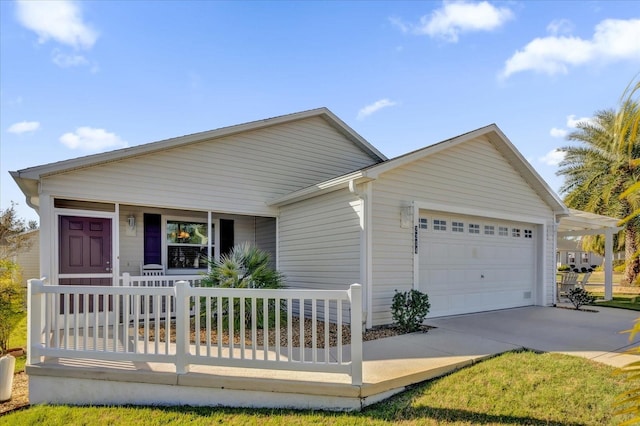 ranch-style house with a garage, covered porch, and driveway