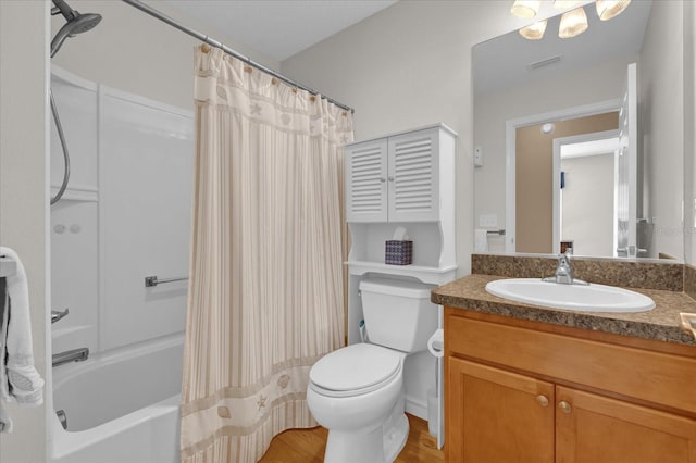 full bathroom featuring wood-type flooring, vanity, toilet, and shower / bath combo