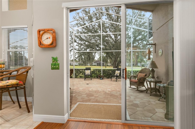 doorway featuring tile patterned flooring