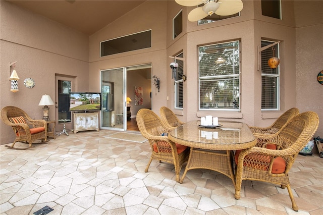 view of patio featuring ceiling fan