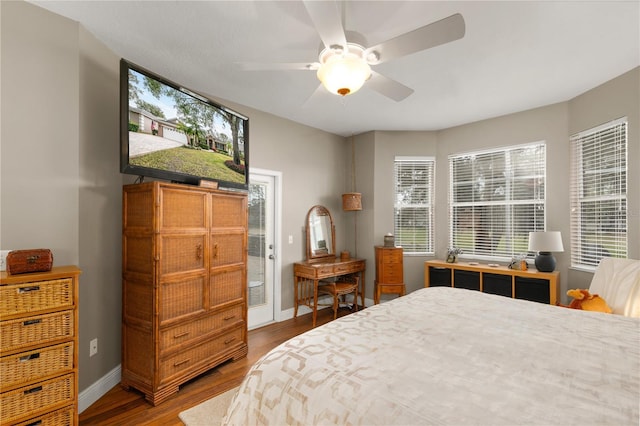 bedroom featuring ceiling fan and hardwood / wood-style floors