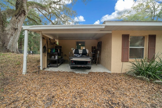 view of parking featuring a carport