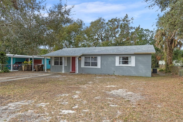 ranch-style house with central AC unit