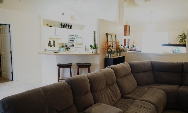 living room featuring light tile patterned floors