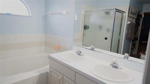 bathroom with vanity and plus walk in shower