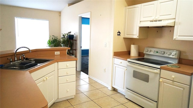 kitchen featuring white cabinetry, sink, white electric stove, and light tile patterned flooring