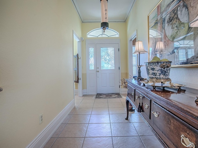 tiled entryway with ornamental molding