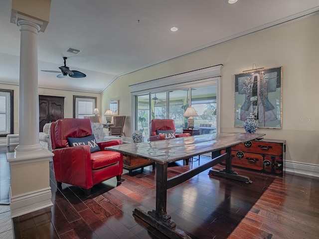 dining room featuring ceiling fan, lofted ceiling, hardwood / wood-style flooring, and decorative columns