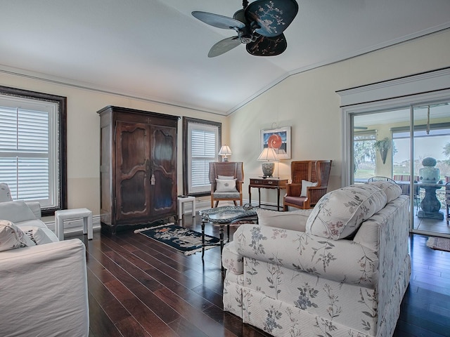 living room featuring ceiling fan, dark wood-type flooring, lofted ceiling, and a healthy amount of sunlight