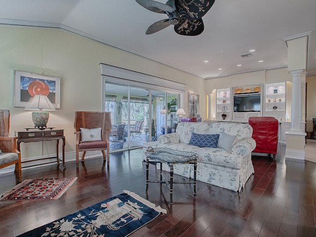 living room featuring ornate columns, dark hardwood / wood-style flooring, lofted ceiling, and ceiling fan