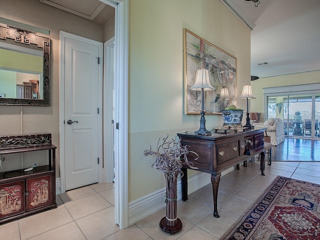 hall with light tile patterned flooring