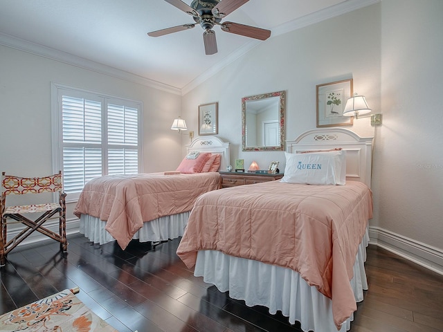 bedroom featuring ceiling fan, vaulted ceiling, dark hardwood / wood-style floors, and crown molding