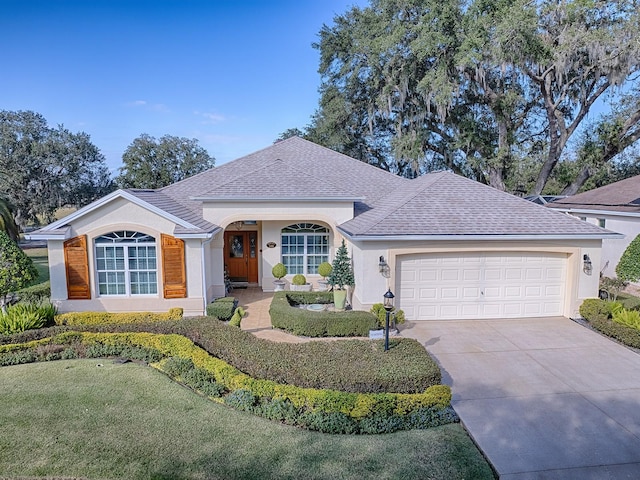 ranch-style home featuring a garage