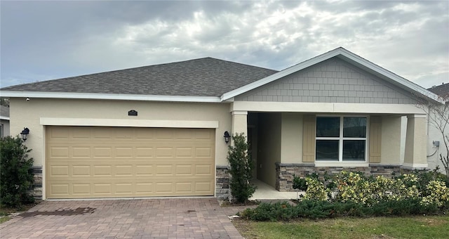 view of front of property with a garage