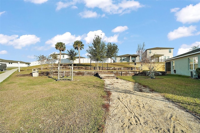 view of yard with central AC unit