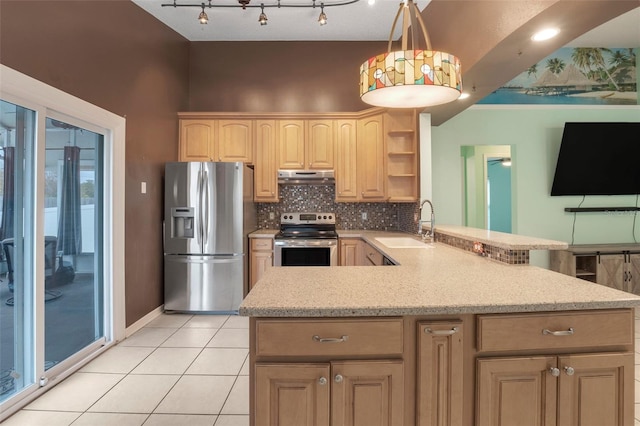 kitchen featuring stainless steel appliances, hanging light fixtures, kitchen peninsula, light brown cabinetry, and sink