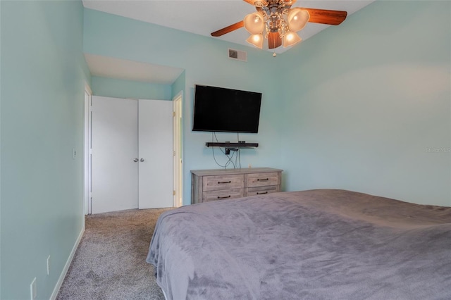 unfurnished bedroom featuring ceiling fan and light carpet