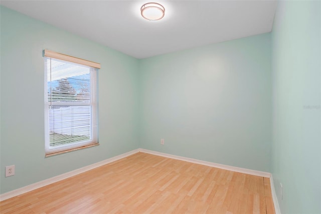 empty room featuring wood-type flooring