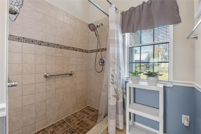 bathroom with a shower with curtain