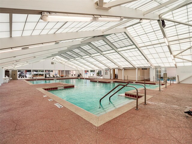 view of swimming pool with a patio area