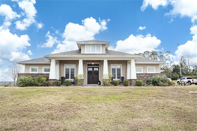 view of front of home featuring a porch and a front lawn